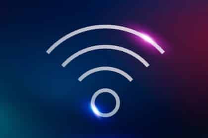 Wifi internet vector technology icon in neon purple on gradient