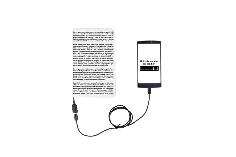 Book connected to a smartphone through an USB cable. Optical character recognition loading bar.