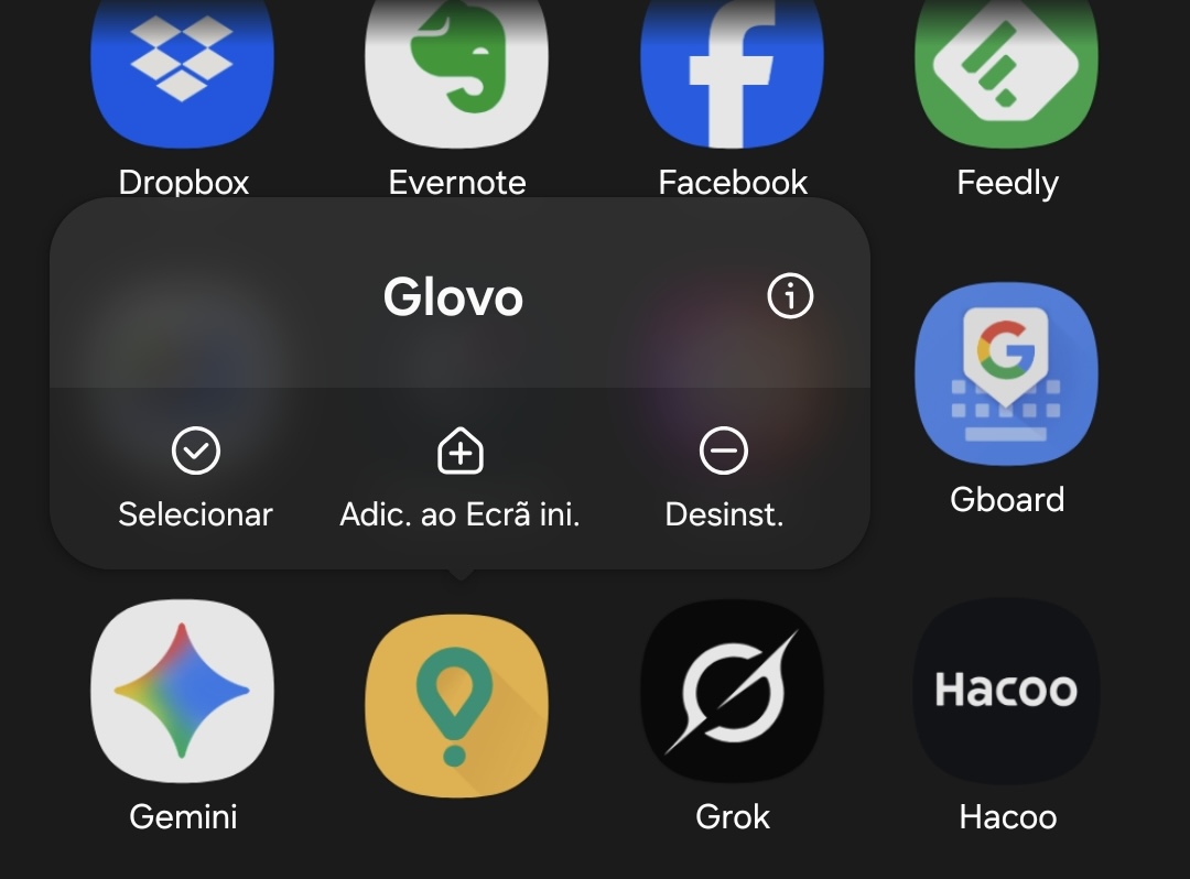 Glovo app with a rounded contextual menu showing actions: Selecionar, Adic. ao Ecrã ini., Desinst.