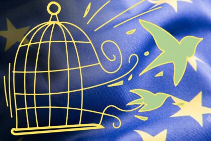 Yellow line drawing of an open birdcage with a bird escaping to the right on a blue background with yellow stars, symbolizing freedom.