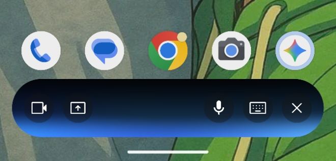 Android home screen showing five app icons (Phone, Messages, Chrome, Camera, Assistant) and a blue rounded quick settings bar with mic, keyboard, and close icons.