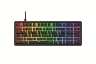 Rainbow-lit wired keyboard with colorful backlighting across the keys, viewed from above.