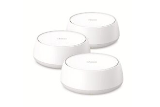 Three white circular Deco mesh Wi‑Fi nodes arranged in a cluster for home internet coverage.