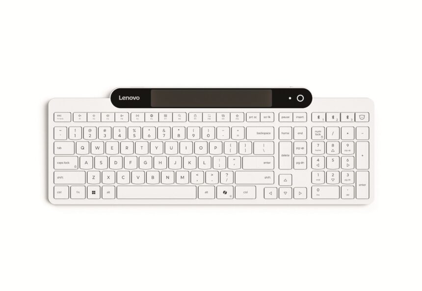 White Lenovo wireless keyboard with low-profile keys and a black top panel containing a power button on the right.