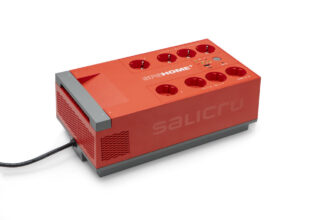 Red IPS Home+ power distribution unit with six European sockets on a gray base, brand Salicru visible on top area
