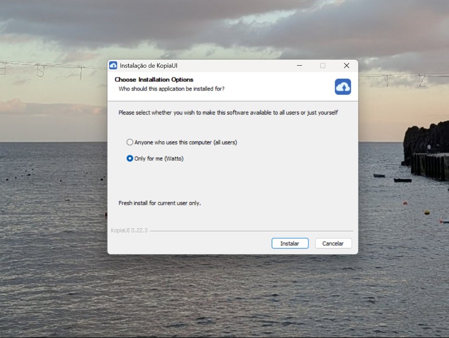 Dialog window for KopiaUI installer over a seascape wallpaper, showing install options 'Anyone who uses this computer' and 'Only for me (Watto)'; buttons 'Install' and 'Cancel' visible.