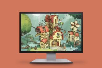 Whimsical fantasy village of red-roofed houses shown on a computer monitor against an orange background