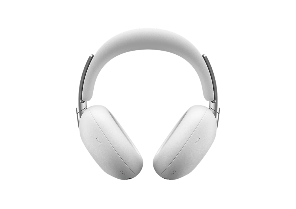 White over-ear headphones with a cushioned headband, isolated on a black background.