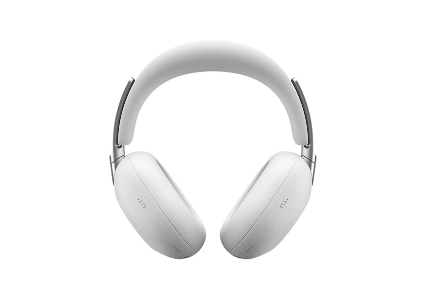 White over-ear headphones with a cushioned headband, isolated on a black background.