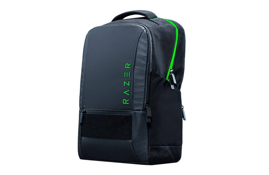 Razer backpack in dark blue/black with a bright green zipper, vertical 'RAZER' branding on the front panel, top handle.