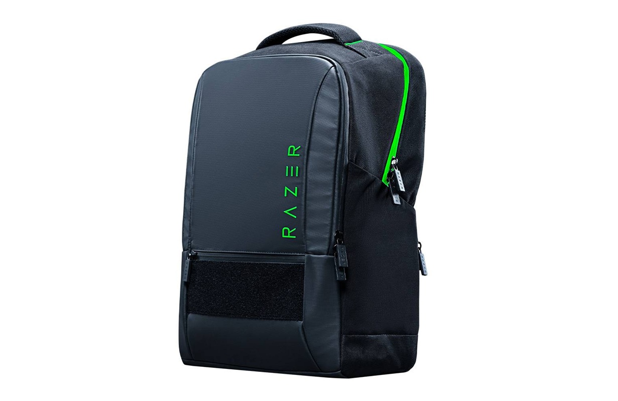 Razer backpack in dark blue/black with a bright green zipper, vertical 'RAZER' branding on the front panel, top handle.