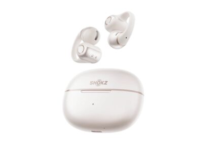 White true-wireless earbuds with a matching white charging case, brand SHOKZ, floating above the case.