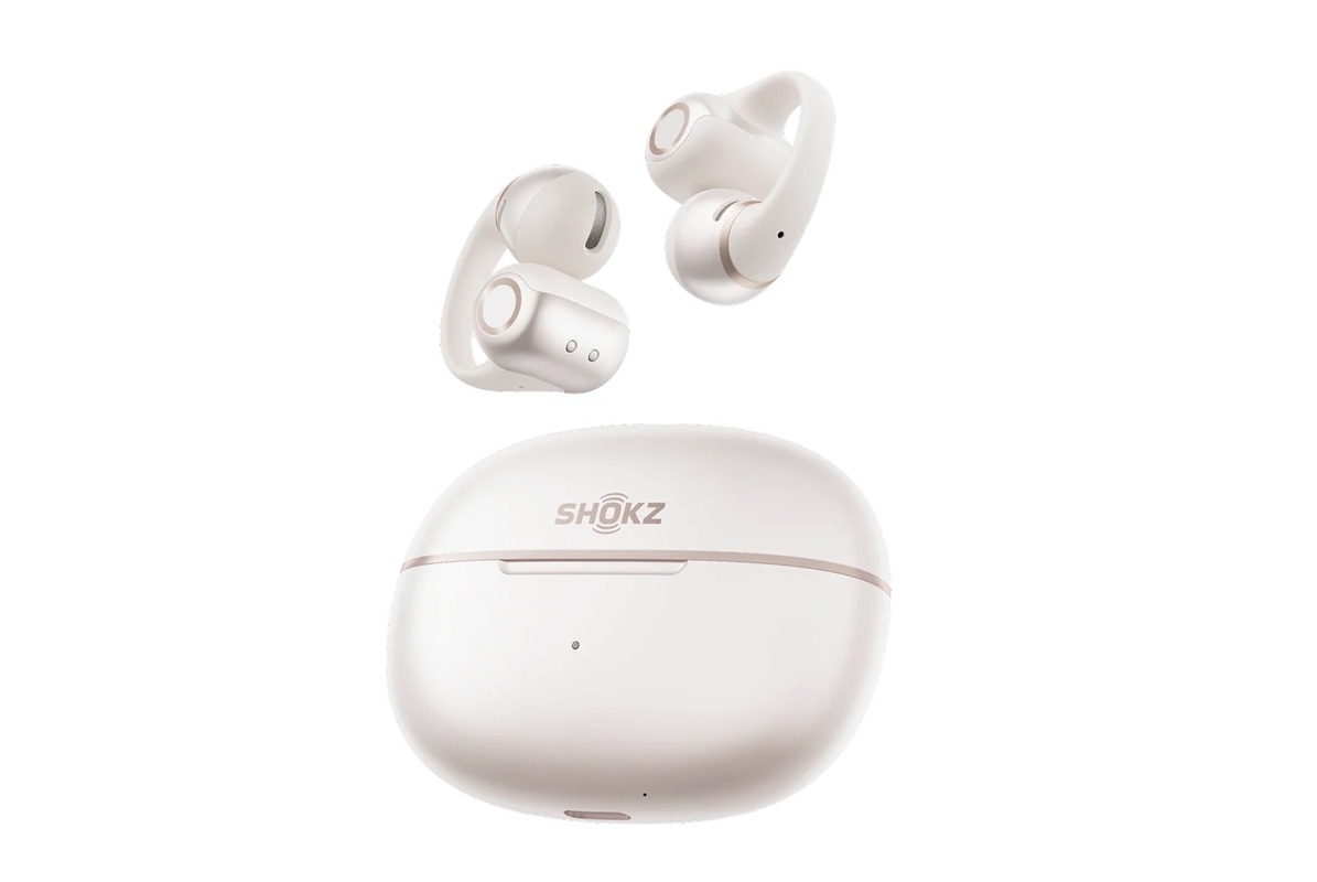 White true-wireless earbuds with a matching white charging case, brand SHOKZ, floating above the case.