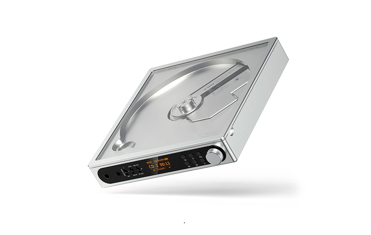 Portable silver turntable with a clear lid, black control panel, and orange display on the front.