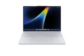 Front view of a white Chromebook with a colorful display on a white background