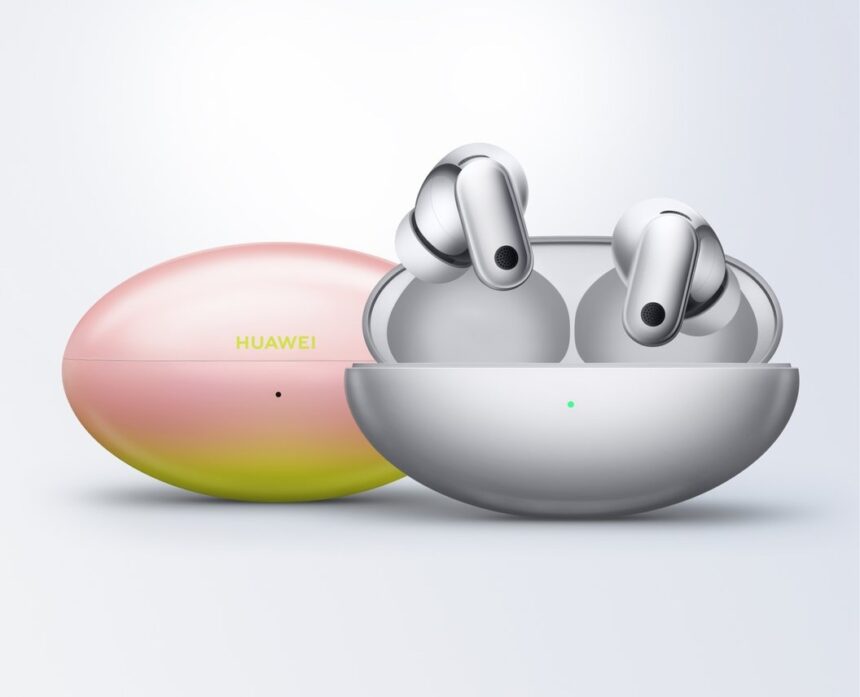 Huawei true wireless earbuds in an open charging case with a gradient pink-yellow protective case beside them, brand visible on the lid.
