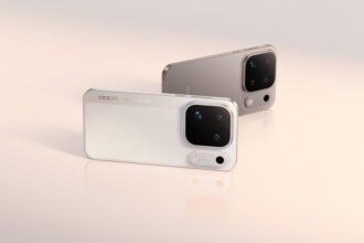 Two OPPO smartphones with large square rear camera modules rest on a glossy peach-toned surface.