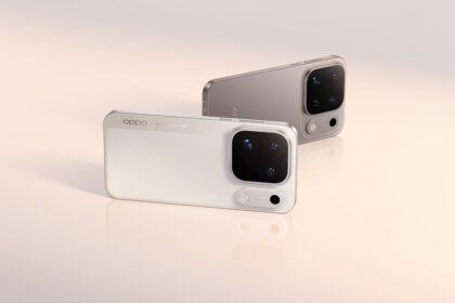 Two OPPO smartphones with large square rear camera modules rest on a glossy peach-toned surface.