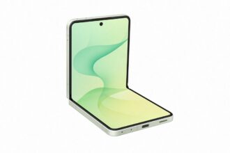 Foldable smartphone opened to 180 degrees, displaying a green gradient wallpaper on the large screen with a light gray frame.