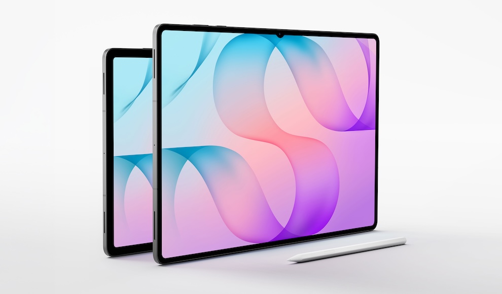 Two tablets with black frames leaning on a white surface, a white stylus resting in front, screens showing blue–pink abstract wallpaper.